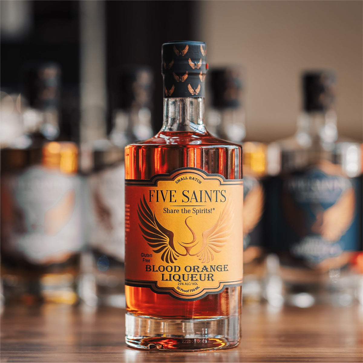 Five Saints Distilling Blood Orange Liqueur bottle, small batch gluten-free low-sugar liqueur made with whole blood oranges, 50 proof 750ml craft spirit from Pennsylvania
